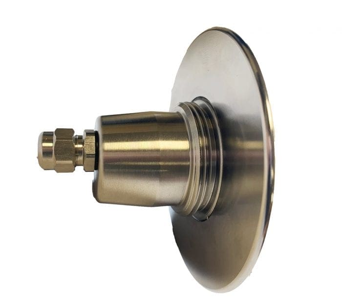 Polished stainless steel circular flange with threaded cylindrical feedthrough and compression fitting protrudes from a flat white background, showing machined surfaces and concentric grooves for mounting.