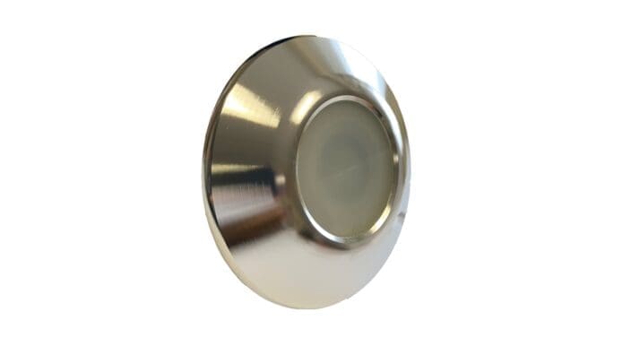 A circular brushed stainless-steel recessed LED puck light presents a frosted central lens and reflective rim, shown unlit and isolated on a plain white background for product display.