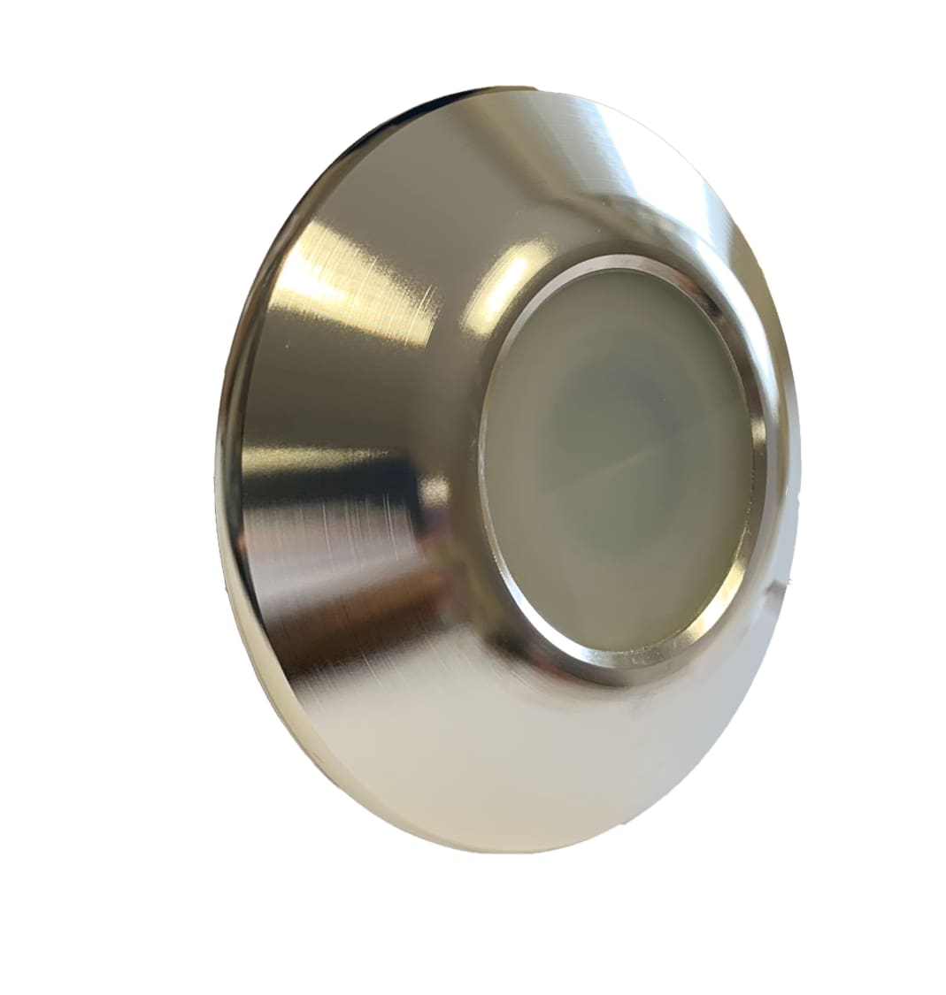 Circular brushed metal recessed LED light sits angled, its frosted central diffuser dimly visible while the shiny rim reflects highlights, shown against a plain white background.